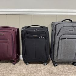 3 Gently Used Suitcases - Samsonite, Traveler’s Choice, & Perry Ellis