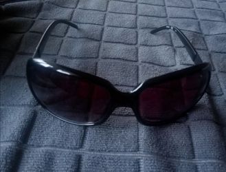 Authentic Calvin Klein ladies sunglasses with john Ford velvet case.
