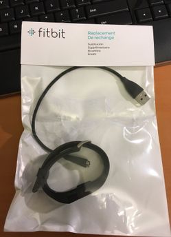 Brand new Fitbit HR with charger