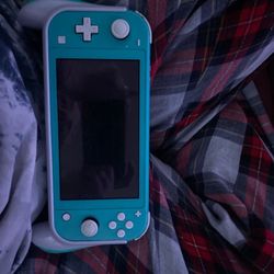 Nintendo Switch Lite And Game 