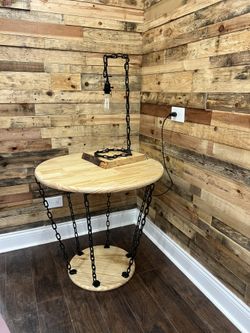 Wood Table With Chains And Lamp