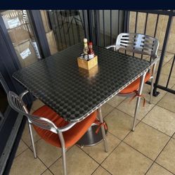 Three Tables And Six Chairs