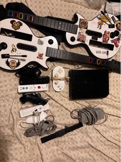 Nintendo Wii Console Bundle w/ 2 guitar hero controllers and 20+ Games