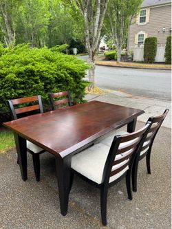 Wooden table and four chairs