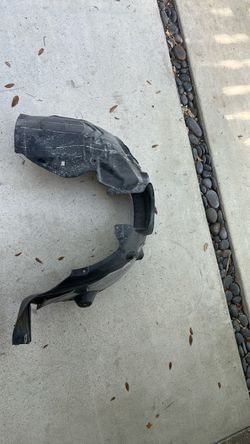 Front passenger fender liner for an f56 mini cooper