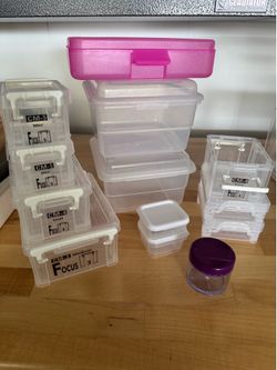 13 small plastic organizers