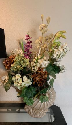 Shell vase faux flower arrangement