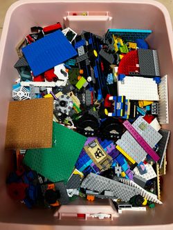 2 large bins of Legos , some mini figures included !