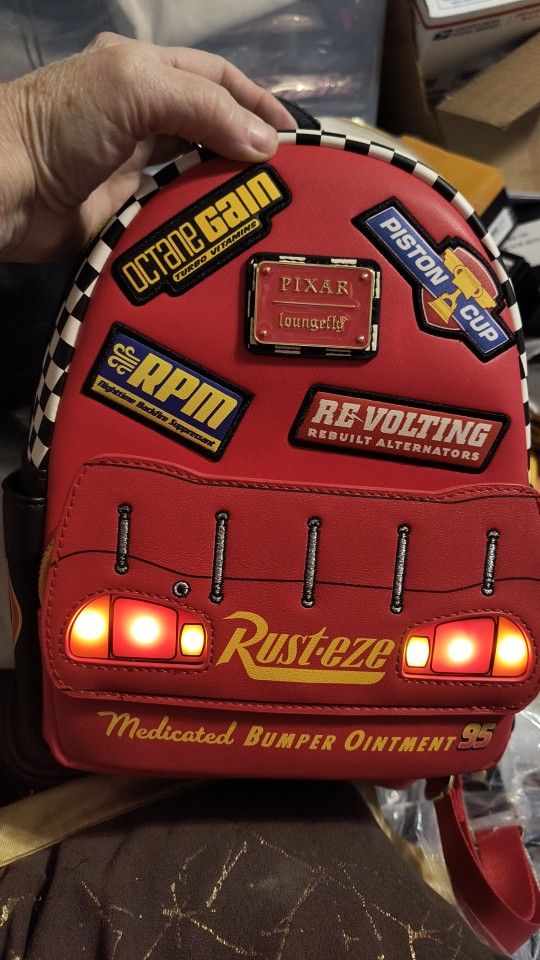 Loungefly Disney Pixar Cars Lightning McQueen Rust-eze Light-up Mini BackpackNWT