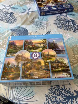 Thomas Kinkade Studios 8-in-1 Jigsaw Puzzle Set