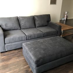 Modern Gray Sofa + Ottoman – Clean, Deep, Comfortable