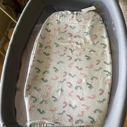 Modern Baby Bassinet with Adjustable Height and Wheels