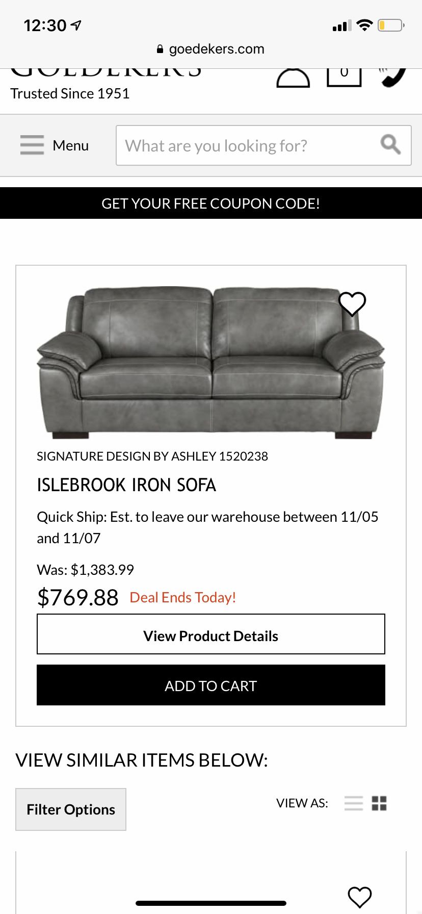 Signature Ashley Islebrook gray iron sofa.