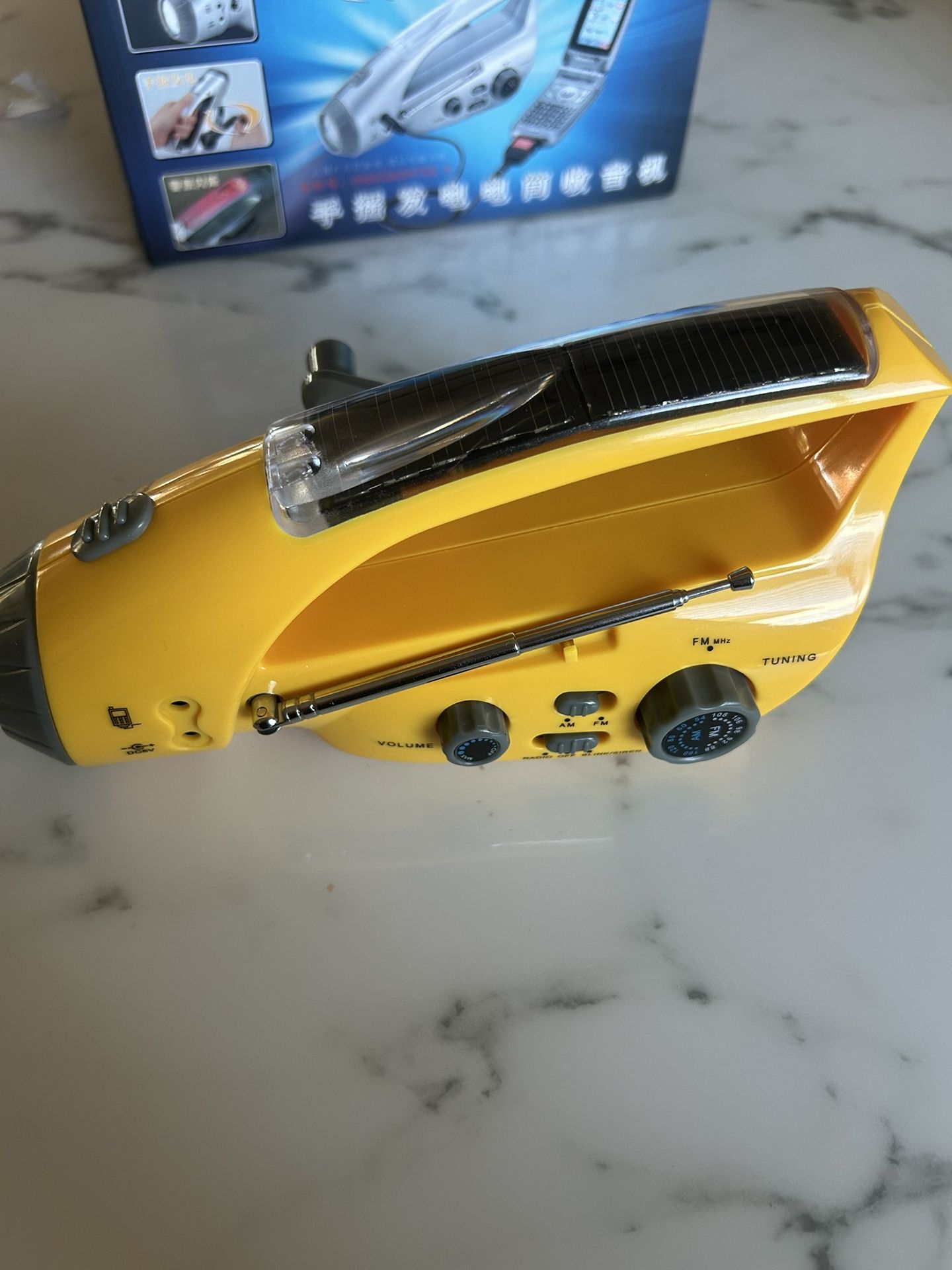Solar Powered Wind Up Radio / flashlight 