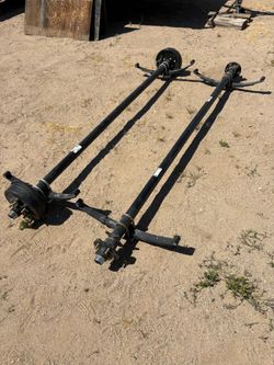 3500 lbs..Trailer axles 74 inch center bolt brand new.