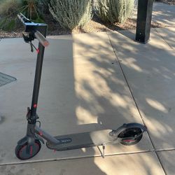 E Scooter It Has A Built In Headlight For Night Time It Also Has Cruise Control. It Has 3 Modes Eco,comfort And Sport 19mph Is The Top Speed