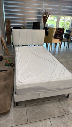 Twin bed with mattress and bed