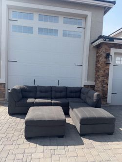 2 piece sectional with ottoman & pullout bed
