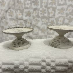 Set of two distressed metal cake/candle stands