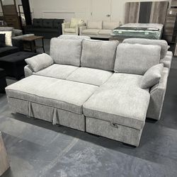 Sleeper Sectional With Storage And Cup Holders 