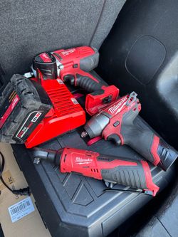 Milwaukee M18 1/2 impact gun + M12 3/8 ratchet + M12 3/8 impact wrench + battery and charger