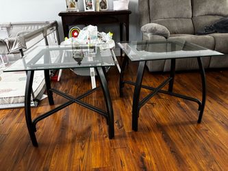 Two glass top end tables