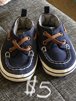 Maybe toddler shoes/crib shoes/boat shoes size 4 or 12 to 18 months