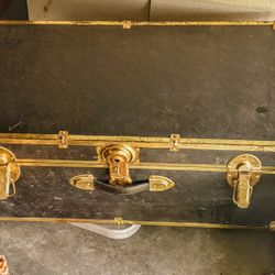 Vintage black leather trunk