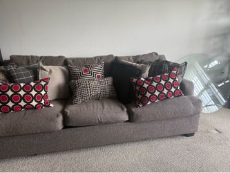 Couch and pillows and coffee table