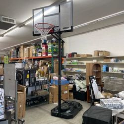 Lifetime 7.5ft. - 10ft. Adjustable Height 54 inch Steel-Framed Shatterproof Outdoor Portable Basketball System