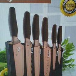 Four Sets Brand New In Box 7 pc. New England Cutlery Titanium Coated knife set and block.