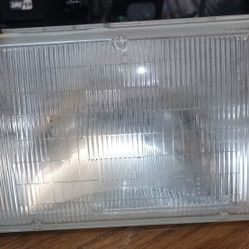 1(contact info removed) Cadillac Fleetwood Brougham  Passenger/ Right  Side Headlight 