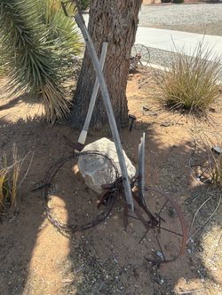 Rustic old plow and old pick axe