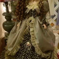 1980 Porcelain Victorian doll. 24 inches.