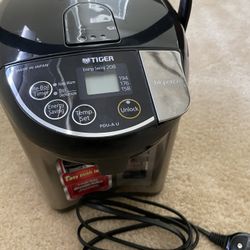 Japanese Tiger kettle kettle with automatic heat preservation.  brand new.  no box.  Haven't used it.  130 dollars.