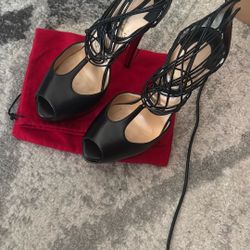 Size 38 Christian Louboutin elastic strap stiletto heels