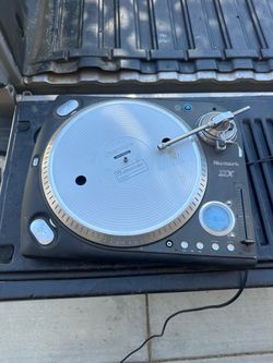 Used Numark TTX-1 direct drive turntables. These units are black with silver platters and tonearms. Each turntable has a high-torque motor, digital di