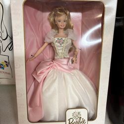 1998 Birthday Wishes Barbie Doll, which is the first in a collector series. Box damage $16.