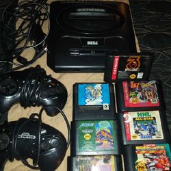Sega With Games Cords And Controllers