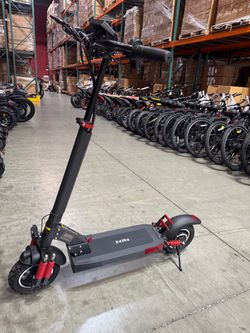 Front and rear shock-absorbing electric scooters