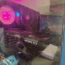 Pc And Two Keyboards And A Mouse 