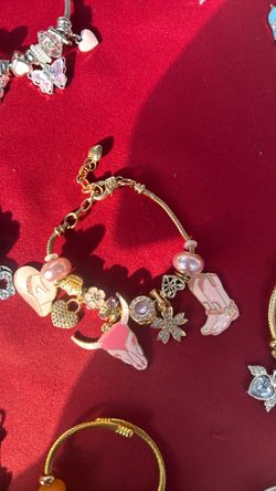 Gold-Tone Charm Bracelet with Pink Charms