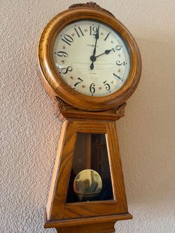 Howard Miller Oak Clock