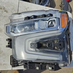 Chevy Silverado 1500 left Headlight lid oem