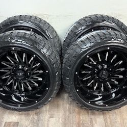 NEW 22x12 gloss black wheels wrapped in RBP 285/45r22 tires