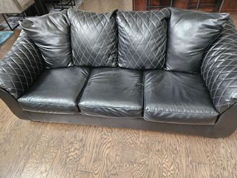 Signature Design - Black loveseat