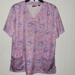 Carebear Scrub Top Size L - NWOT
Tag says XS, but it runs super big. I would say it's a large, maybe even XL
