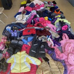HUGE LOT OF CHILDRENS SNOW CLOTHES AND  SLEDS GREAT FOR RESALE**
