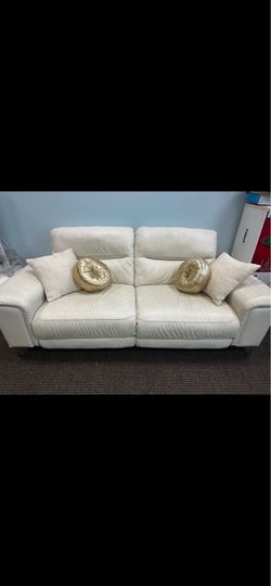 White Reclining Leather Loveseat with Adjustable Headrests