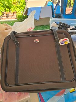 American Tourist Garment Luggage